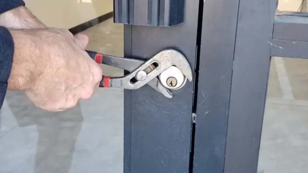 Locksmith rekeying a deadbolt lock for a home in Holt, AL