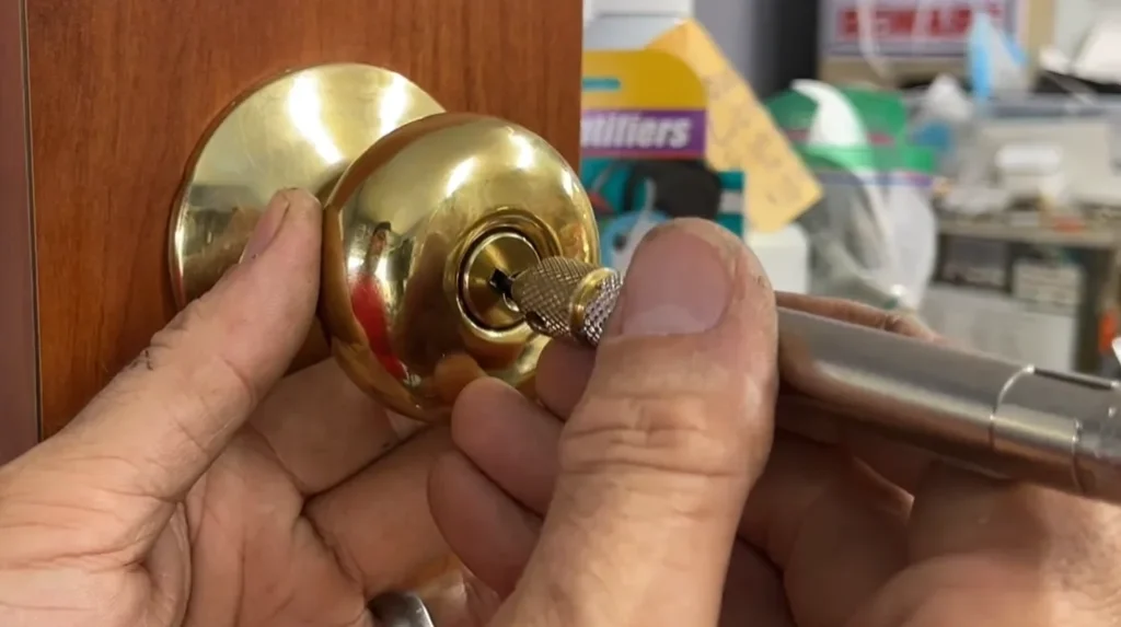 A Vintage brass door knob rekeyed by a locksmith in Moundville, AL